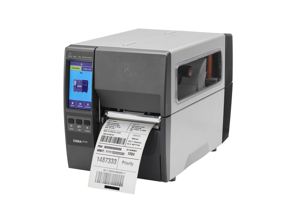 Zebra ZT231 label printer front left with label