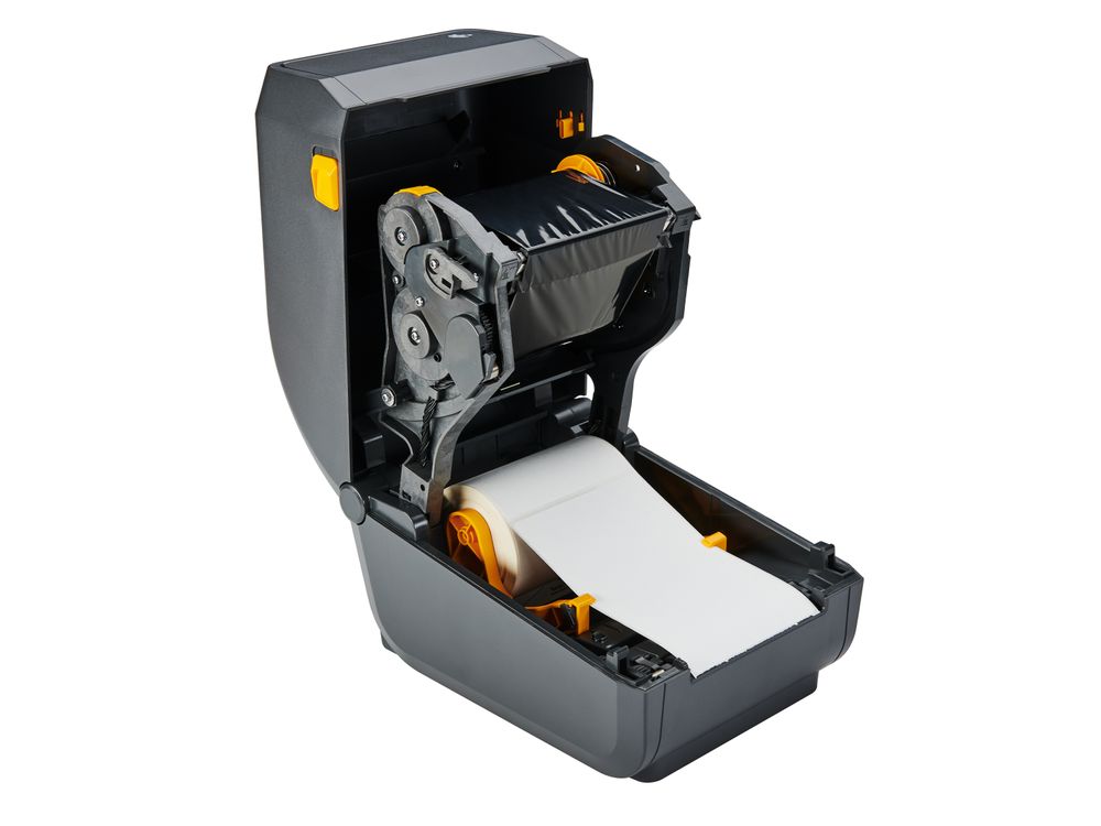 Zebra ZD230t printer opened with ribbon and label roll inserted