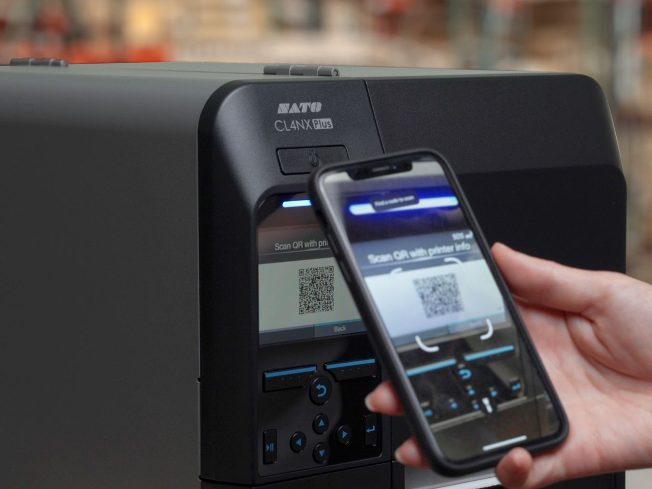 Sato CL4NX Plus label printer connected to smartphone