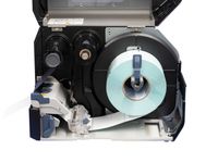 Sato CL4NX Plus label printer open with label roll inserted