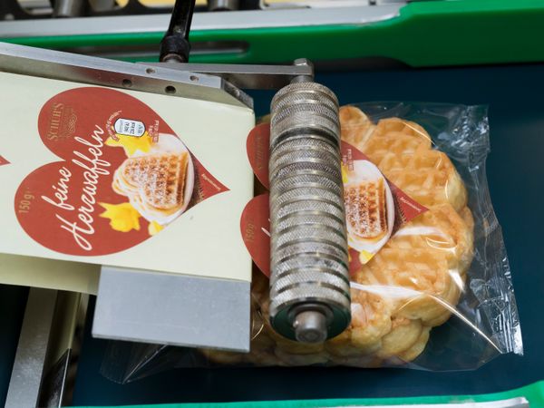 Alpha Compact labeling on food packaging