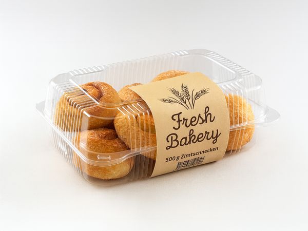 Labeling system Geset 218 C-Wrap label on cinnamon rolls