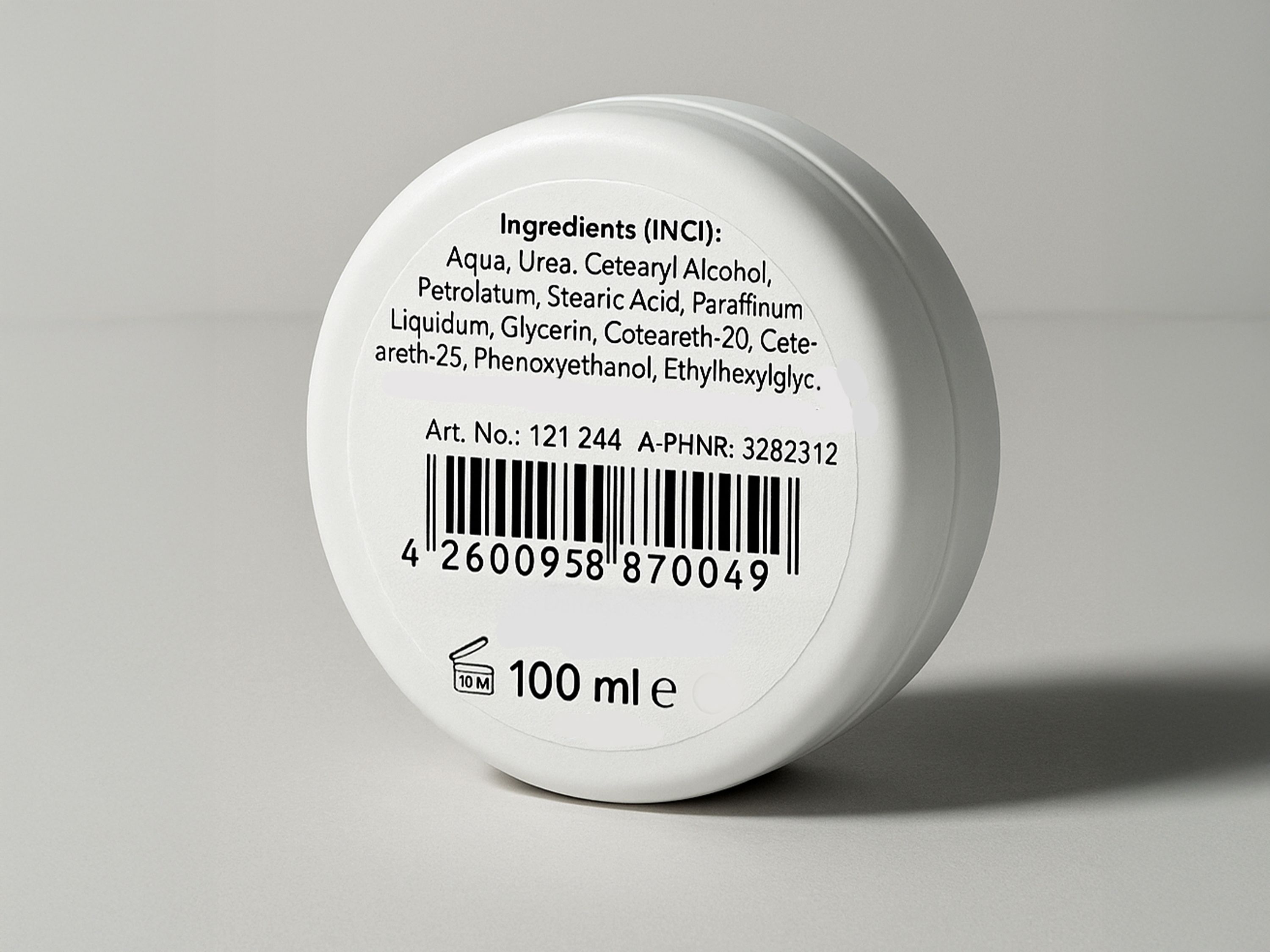 Geset 212 labeling system Label on the bottom of a plastic jar for cosmetics